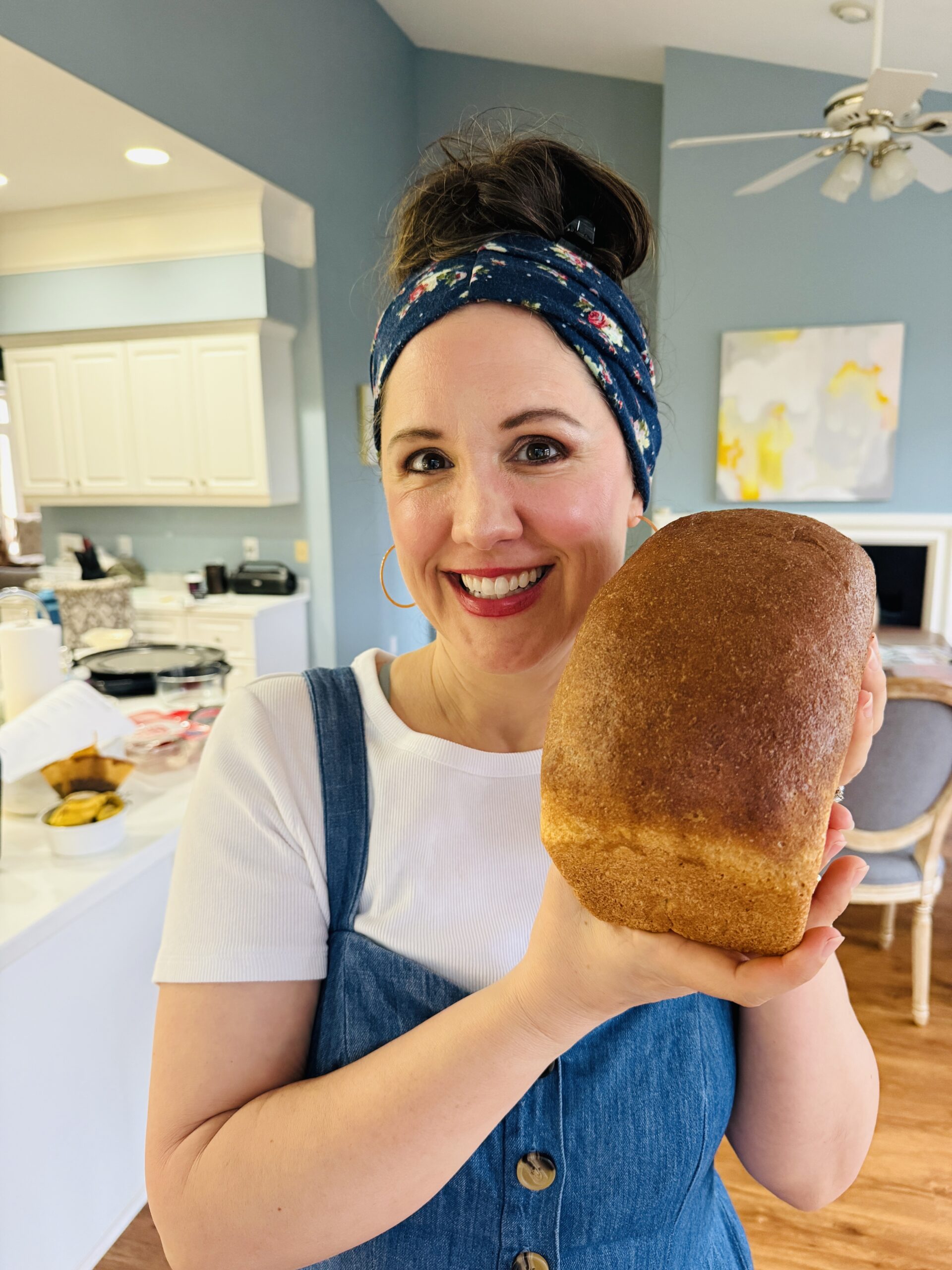 One loaf of fresh milled flour sandwich bread with text overlay reading One Loaf Easy Bread