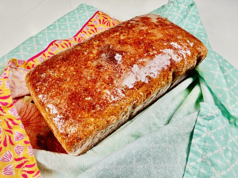 Spelt sourdough sandwich loaf fresh from the oven, golden crust