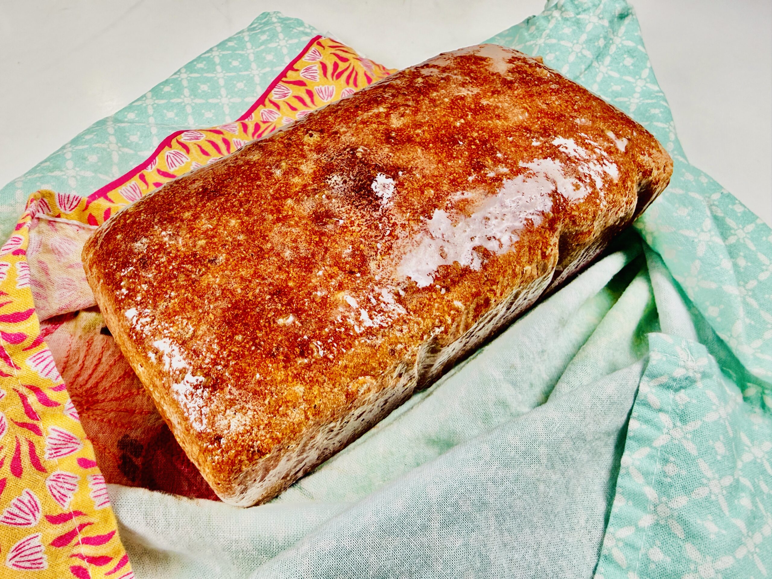 Spelt sourdough sandwich loaf fresh from the oven, golden crust