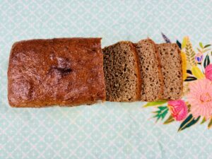 Sliced spelt sourdough sandwich loaf showing open crumb